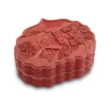 The cover is finely carved through thick layers of cinnabar lacquer to depict one of the either immortals-Tian Guaili in the river landscape. by Qianlong Period A Fine Chinese Cinnabar Carved Lacquer Ruyi Formed Box And Cover, sold Nov 2025