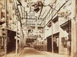 John Thompson, Bonham Strand within the Bamboo Supported Canopy, Hong Kong, 1869, albumen paper photograph