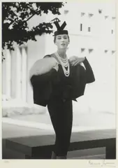 Bruno Benini, Di Masters Wearing a Hall Ludlow Black Suit and Pillbox Hat, 1956, silver gelatin photograph