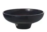 Fratelli Toso, A MURANO GLASS BOWL, The ogee shaped black glass bowl internally decorated with a spiral of orange, red and copper glass, paper label to base.