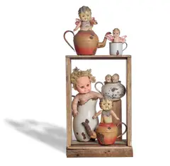 The Teaparty 1980 by Rosalie Gascoigne, 1980, weathered wooden apiary box, plastic carnival sideshow dolls and wings, rusted enameled metal utensils, sold Nov 2024