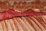 Central Australian Landscape by Sidney Nolan, oil and pastel on paper, sold Mar 2024