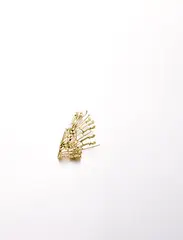 Résurrection by Arman, 18K Gold brooch, edition no. 5/8, offered Nov 2016
