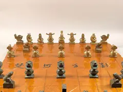 Chess (32 pieces) by Ju Ming, 1987, Bronze sculpture, edition of 30, sold Dec 2009