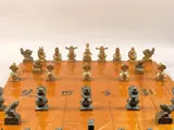 Chess (32 pieces) by Ju Ming, 1987, Bronze sculpture, edition of 30, sold Dec 2009