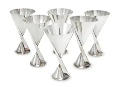 A set of six silvered-metal martini cups, circa 1928 by Maison Desny, 1928, offered Jul 2019