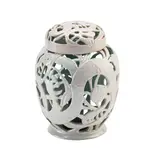 Klytie Pate, Lamp base and cover, circa 1950, 1950, wheel-thrown earthenware, the baluster body with a pierced design depicting a dragon amongst foliage, the cover with conforming decoration, cream and turquoise glaze