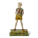Ferdinand Preiss, 'Sonny Boy', first half 20th century, cast and carved in patinated bronze and ivory as a boy standing with his legs apart, his head averted and a book held under his left arm, incised signature 'F. Preiss' to the green onyx base