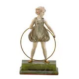 Ferdinand Preiss, 'Hoop Girl', first half 20th century, cast and carved in patinated bronze and ivory as a girl standing with a large hoop held behind her back, incised signature 'F. Preiss' to the green onyx base
