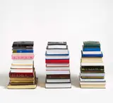 Hubert Czerepok, Salvation Islands, 2009, 3 Bücherstapel, 3 Pistolenkugeln, 1 Video