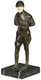 Maurice Guiraud-Rivière, A Jockey, Patinated bronze and carved ivory on marble base