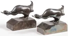 Georges H Laurent, A pair of Squatting Duck Bookends, Bronze with silver patina