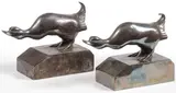 Georges H Laurent, A pair of Squatting Duck Bookends, Bronze with silver patina