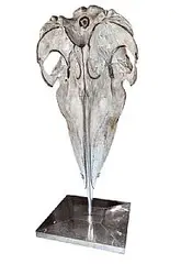 Dr. Dublin, Beauty and Death, 2007, fossilised whale skull inlaid with pure silver mounted on stand