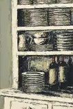 Yvonne Moore, Wine Bottles and Stacked Dishes, oil on canvas