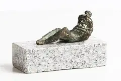 Reclining Figure by Edward Delaney, bronze on granite base, sold May 2021