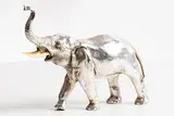 20th Century Oriental School, Elephant, silver plated sculpture
