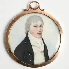 Frederick Buck, Portrait of a Gentleman in a Navy Blue Coat, watercolour on ivory, tondo 5 in a rose gold frame