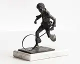 Child Playing by Jill Cowie Sanders, bronze on marble base, sold Sep 2019