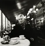 Samuel Beckett Seated in Cafe, Paris by John Minihan, 1985, silver gelatin print, number 42 from an edition of 100, sold Oct 2017