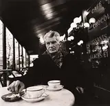 Samuel Beckett photographed in Paris Cafe on Boulevard St. Jacque, December by John Minihan, 1985, silver gelatin print, sold Aug 2017