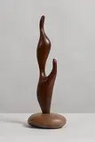 Michael Casey, Mother and Child, bog yew raised on a circular stone base (2.7kg)