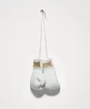 Gary Simmons, Everforward..., 1993, Pair of white leather boxing gloves with metallic gold thread and satin multiple