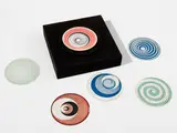 Marcel Duchamp, Rotoreliefs (Optical Disks) (S. 441d), 1935/1965, The complete multiple comprised of 12 offset lithographs in colors, printed on both sides of six round cardboard disks (to be viewed as they rotate 33 1/3 revolutions per minute), with the black plastic circular disc holder and black velvet-covered motorized wall-hanging unit with original motor and wiring, with metal and magnet revolving platform and two black velvet-covered viewers in different widths
