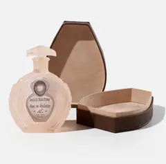 Belle Haleine (Peach) by Annette Lemieux, 2015, Individually constructed surrogate cast resin perfume bottle with label redesign including the artist as Rrose Sélavy, c, sold Apr 2026