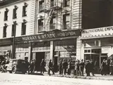 Job Applicants Waiting Outside the International Employment Agency, Howard Street, San Francisco by Dorothea Lange, 1937, Gelatin silver print, offered Apr 2026