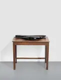 Jimmie Durham, Different Ways of Organizing Matter in Venice, 2015, found wood and glass on found wooden table