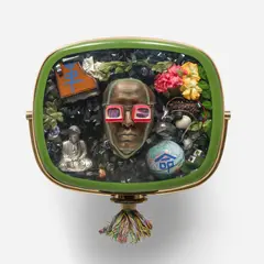Self-Portrait by Nam June Paik, 1989, 1950s Philco Predicta television cabinet containing bronze mask of the artist, video tape, antique TV cubes and circuit , sold Sep 2025