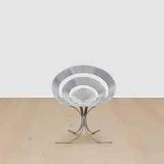 "Ring" Chair by Maria Pergay, 1968, stainless steel, sold Jul 2025
