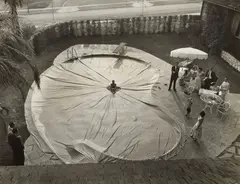 Swimming Pool Cover by Loomis Dean, c. 1951, Ferrotyped gelatin silver print, offered Dec 2023