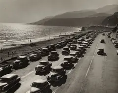Ed Clark, Santa Monica Coastline with Cars, 1951, Gelatin silver print; the photographer's Life Magazine credit stamps and a hand-stamp dated 'Aug 21 1951' on the reverse