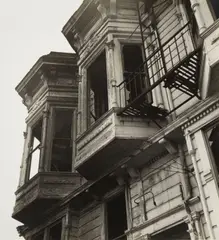 Apartment Building by Dorothea Lange, c. 1940, Gelatin silver print, probably printed c. 1950, offered Dec 2023