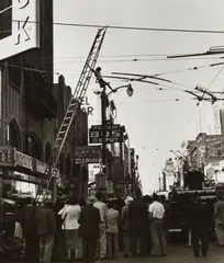 Girl on Trolley Wires, c. 1940s by Dorothea Lange, Ferrotyped gelatin silver print, probably printed between 1960 and 1965, offered Dec 2023