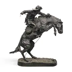 Frederic Remington, The Bronco Buster, bronze with dark brown patina