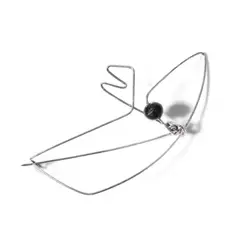 Wire Pin with Black Bead by Claire Falkenstein, circa 1948, silver with wire and polished black bead, sold Apr 2022