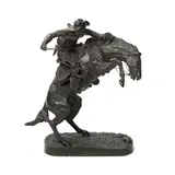 The Bronco Buster by Frederic Remington, 1895, bronze with brown patina, sold Apr 2022