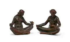 Abastenia St. Leger Eberle, Omar Khayyam Bookends, 1913, bronze with reddish brown patina, each