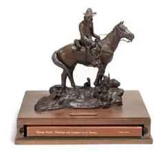 Gerald Harvey, Taking Stock, 1986, bronze with dark brown patina, wood case and book