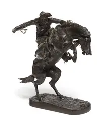 The Broncho Buster by Frederic Remington, 1895, bronze with dark brown patina, sold Apr 2019
