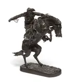 The Broncho Buster by Frederic Remington, 1895, bronze with dark brown patina, sold Apr 2019