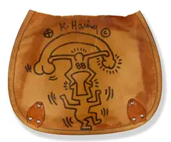 Untitled by Keith Haring, acrylic on leather, sold Oct 2017