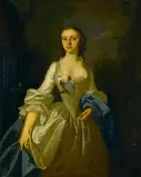 Thomas Hudson, A portrait of a lady in a white gown, three-quarter-length, oil on canvas