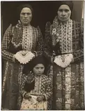 Margaret Bourke-White, Czech Peasant Women and Child Wearing Bohemian Clothes, 1938, Warm-toned gelatin silver print