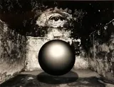 Jerry Uelsmann, Untitled (Floating sphere in eye room)