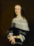 Nicolaes Maes, A portrait of a lady, half-length, holding a fan, oil on canvas