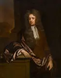 A portrait of a gentleman, three-quarter length, standing, his right arm resting on a plinth by Godfrey Kneller, oil on canvas, offered Sep 2014